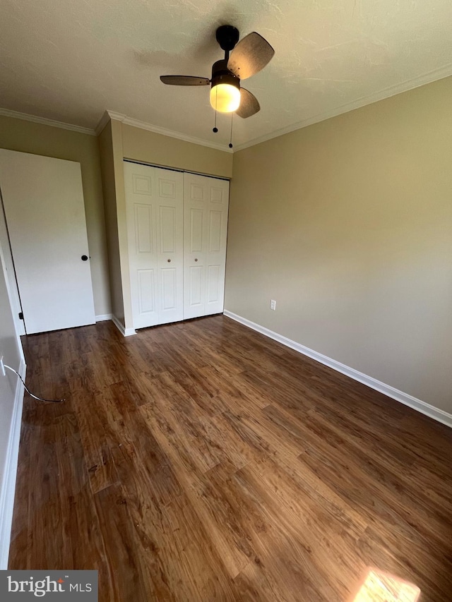 28 Wenner Dr, Brunswick, MD 21716 - unfurnished bedroom featuring a closet, dark wood finished floors, and baseboards