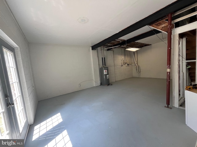 28 Wenner Dr, Brunswick, MD 21716 - basement featuring electric water heater and concrete block wall