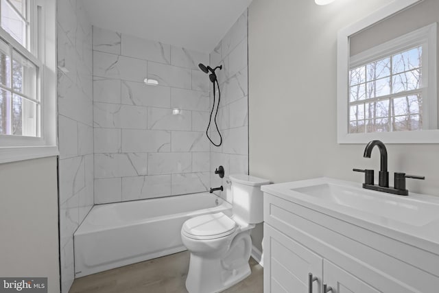 full bathroom with vanity, toilet, and bathtub / shower combination