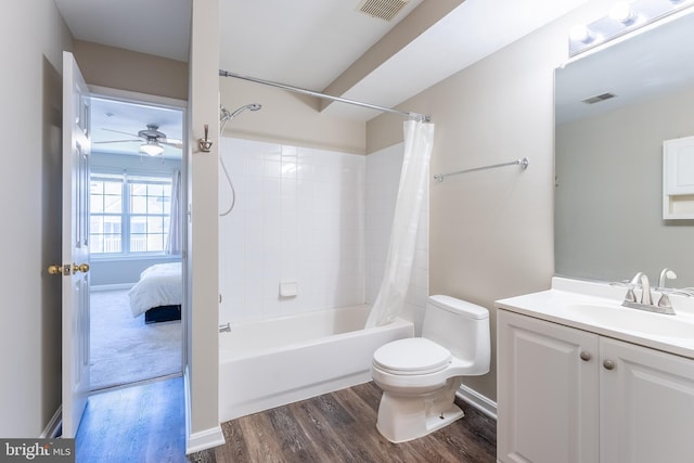 645 Constellation Sq SE Unit L, Leesburg, VA 20175 - full bathroom with vanity, visible vents, wood finished floors, toilet, and shower / bathtub combination with curtain