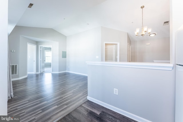 645 Constellation Sq SE Unit L, Leesburg, VA 20175 - empty room with visible vents, wood finished floors, baseboards, a chandelier, and vaulted ceiling