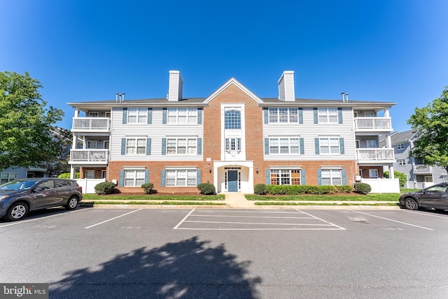645 Constellation Sq SE Unit L, Leesburg, VA 20175 - view of building exterior with uncovered parking