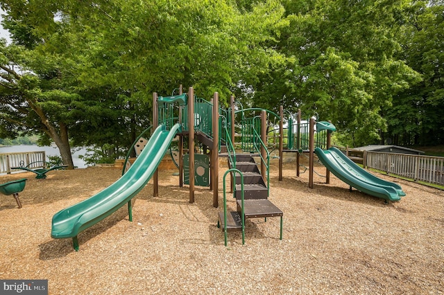 community jungle gym featuring fence
