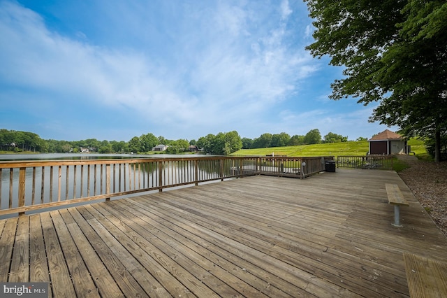 deck featuring a water view
