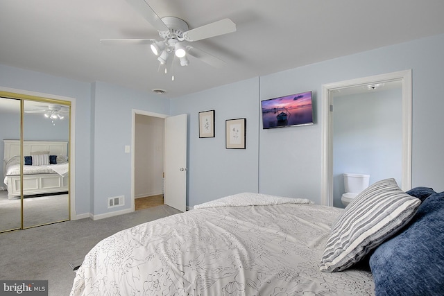 carpeted bedroom featuring baseboards, visible vents, a ceiling fan, and a closet