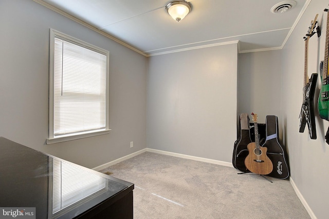 interior space featuring baseboards, visible vents, ornamental molding, and carpet floors