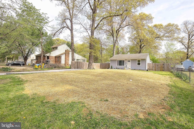 view of yard with fence