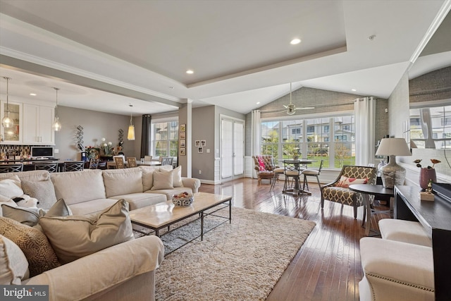 6179 Creekside Dr, Flourtown, PA 19031 - living area featuring ceiling fan, a wealth of natural light, wood-type flooring, and vaulted ceiling