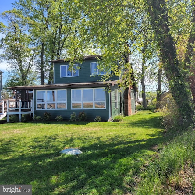 3734 1st Ave, Edgewater, MD 21037 - back of property featuring a deck and a yard