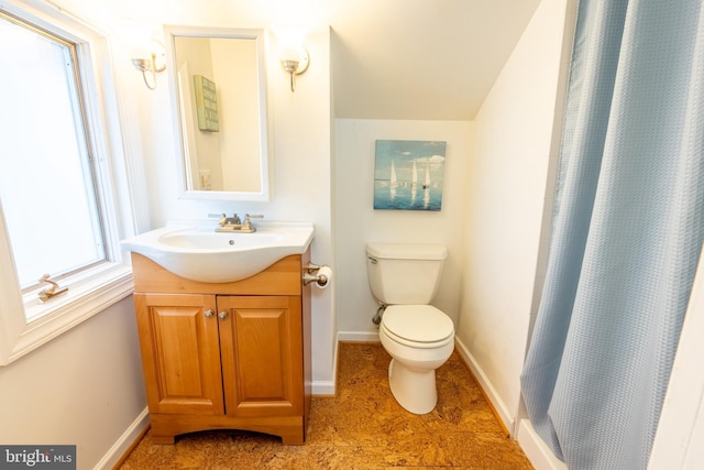 3734 1st Ave, Edgewater, MD 21037 - bathroom featuring vanity, toilet, curtained shower, and baseboards