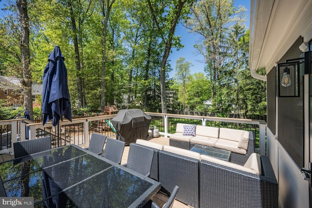 wooden deck with outdoor lounge area, outdoor dining area, and a grill