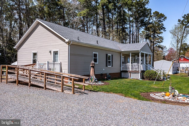 33 Douglas St, Reedville, VA 22539 - back of house featuring a porch, a wooden deck, a yard, and roof with shingles