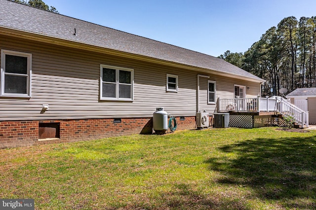 33 Douglas St, Reedville, VA 22539 - rear view of house featuring a deck, a yard, ac unit, crawl space, and central AC