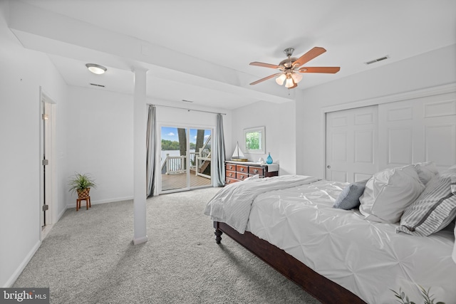 carpeted bedroom featuring visible vents, ceiling fan, access to exterior, a closet, and baseboards