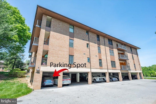 3209 Falcon Ln Unit 229, Wilmington, DE 19808 - view of property with covered parking
