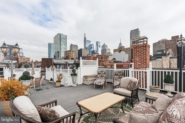 2217 Locust St, Philadelphia, PA 19103 - wooden terrace with a view of city and an outdoor living space