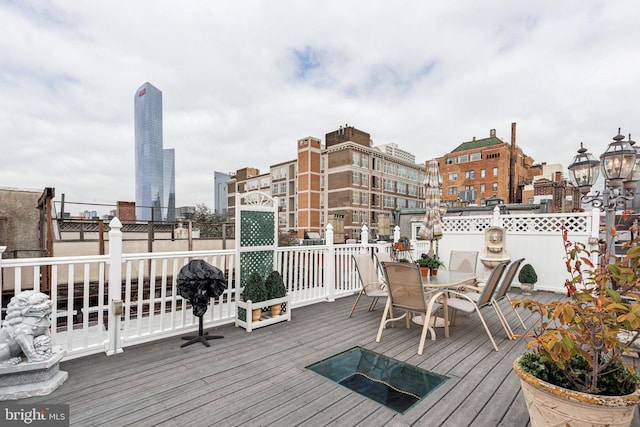 2217 Locust St, Philadelphia, PA 19103 - wooden deck featuring outdoor dining space