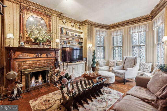2217 Locust St, Philadelphia, PA 19103 - living area featuring a fireplace, crown molding, and wood-type flooring