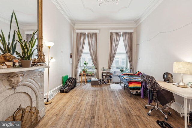 2217 Locust St, Philadelphia, PA 19103 - sitting room featuring ornamental molding, a chandelier, wood finished floors, and baseboards