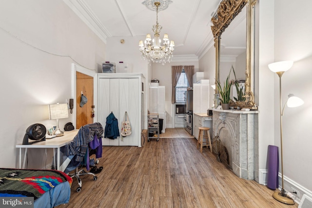 2217 Locust St, Philadelphia, PA 19103 - interior space featuring ornamental molding, a notable chandelier, wood finished floors, and visible vents