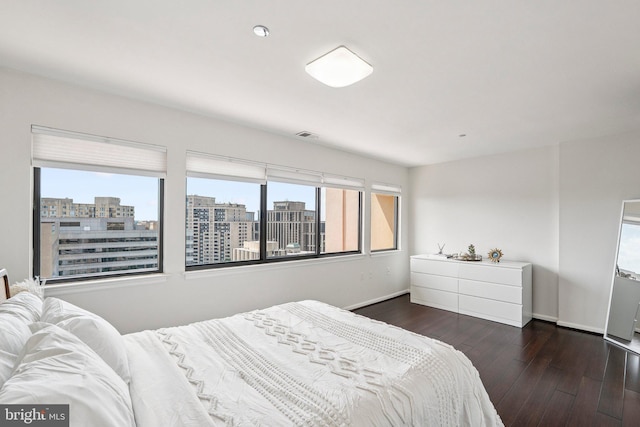 1301 N Courthouse Rd Unit 1812, Arlington, VA 22201 - bedroom featuring dark wood-style flooring and a view of city
