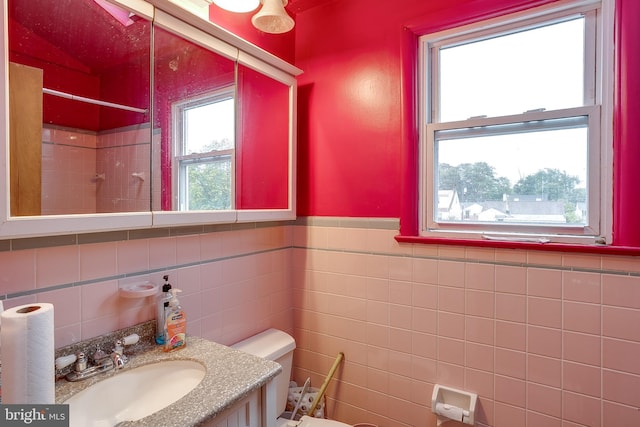 121 E Lafayette Ave, Magnolia, NJ 08049 - full bathroom featuring a tile shower, tile walls, toilet, vanity, and a wainscoted wall