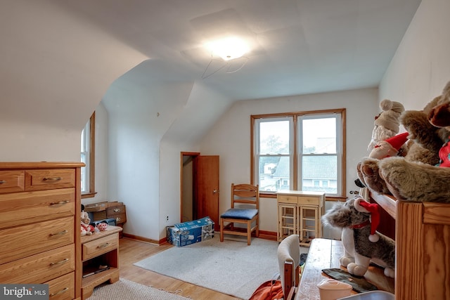 121 E Lafayette Ave, Magnolia, NJ 08049 - bedroom with light wood-type flooring, vaulted ceiling, and baseboards