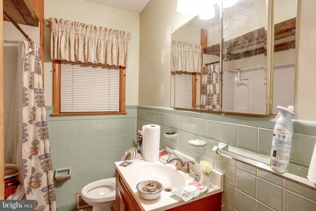 121 E Lafayette Ave, Magnolia, NJ 08049 - full bathroom featuring vanity, tile walls, toilet, a shower with curtain, and a wainscoted wall