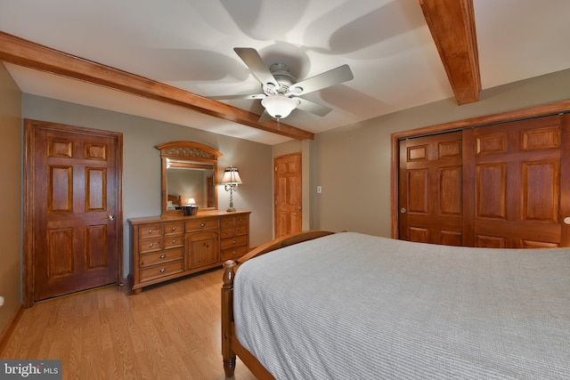 3703 Spruce St, Bristol, PA 19007 - bedroom featuring a ceiling fan, a closet, beam ceiling, and light wood-type flooring
