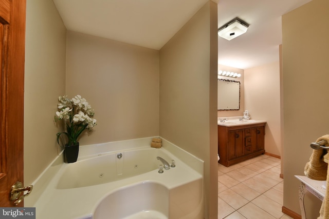 3703 Spruce St, Bristol, PA 19007 - bathroom with tile patterned floors, a tub with jets, and vanity