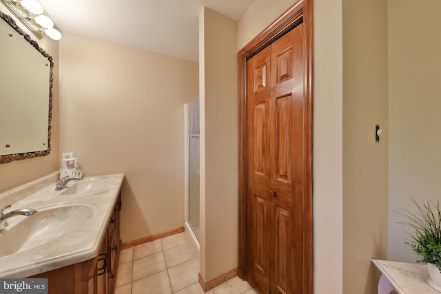 3703 Spruce St, Bristol, PA 19007 - bathroom with double vanity, a sink, tile patterned floors, and a shower stall