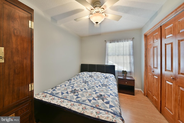 3703 Spruce St, Bristol, PA 19007 - bedroom with a ceiling fan, a closet, light wood finished floors, and a textured ceiling