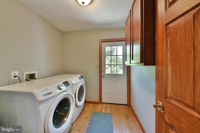 3703 Spruce St, Bristol, PA 19007 - laundry room featuring washer and dryer, laundry area, a textured ceiling, baseboards, and light wood-type flooring