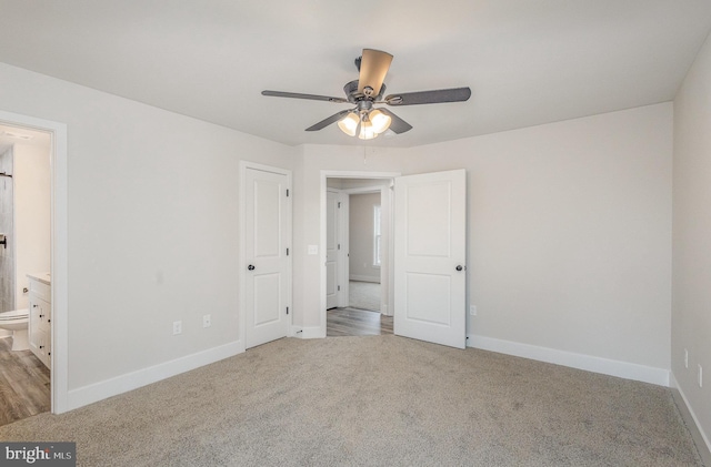 5 Cornwallis Cv, Ruther Glen, VA 22546 - unfurnished bedroom with ensuite bathroom, a ceiling fan, carpet floors, and baseboards