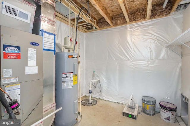 5 Cornwallis Cv, Ruther Glen, VA 22546 - utility room featuring heating unit and electric water heater