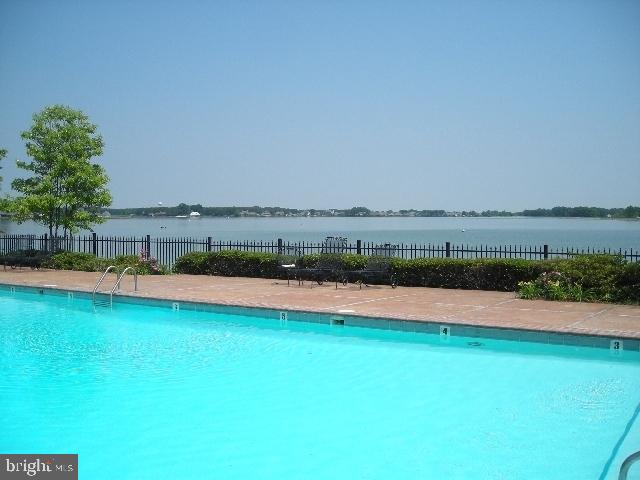 5 Cornwallis Cv, Ruther Glen, VA 22546 - pool featuring fence and a water view