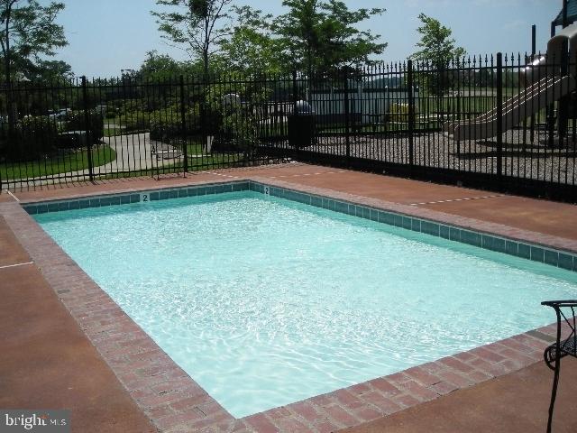 5 Cornwallis Cv, Ruther Glen, VA 22546 - view of swimming pool featuring fence and a fenced in pool