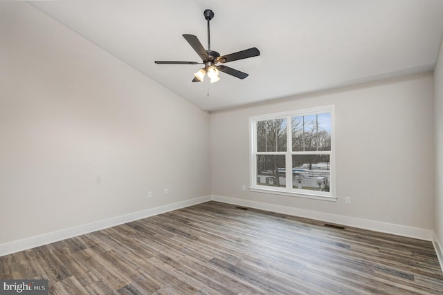 5 Cornwallis Cv, Ruther Glen, VA 22546 - empty room with wood finished floors, ceiling fan, baseboards, visible vents, and lofted ceiling