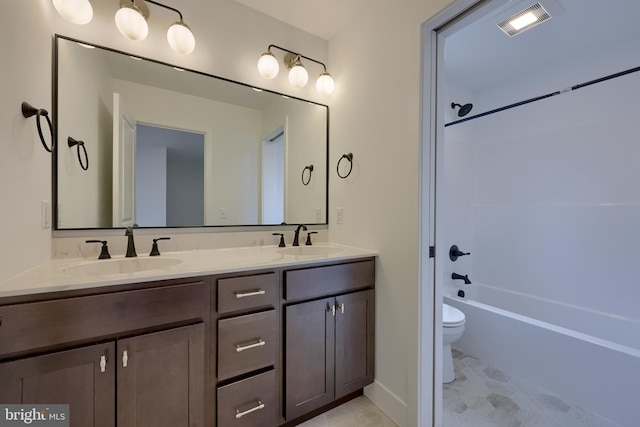 520 Woodcrest Ave, Lititz, PA 17543 - full bathroom featuring toilet, double vanity, a sink, and visible vents