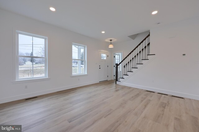 520 Woodcrest Ave, Lititz, PA 17543 - foyer featuring recessed lighting, stairway, light wood-style floors, and baseboards