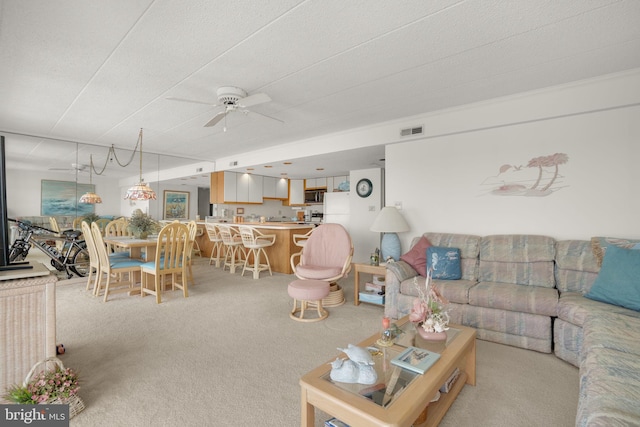 423 14th St Unit 205K, Ocean City, MD 21842 - living area with light colored carpet, visible vents, and ceiling fan