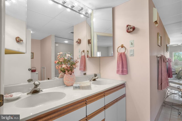 423 14th St Unit 205K, Ocean City, MD 21842 - full bathroom with a sink, double vanity, and tile patterned floors