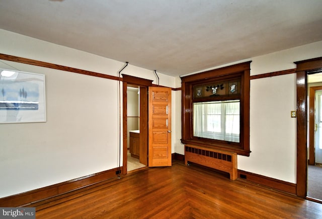 133 Main St, East Greenville, PA 18041 - empty room featuring radiator heating unit, baseboards, and wood finished floors