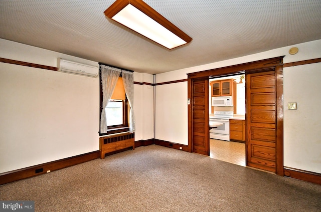 133 Main St, East Greenville, PA 18041 - unfurnished room featuring an AC wall unit and baseboards