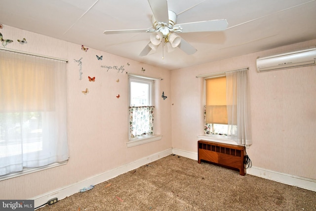 133 Main St, East Greenville, PA 18041 - unfurnished room featuring a wall mounted air conditioner, ceiling fan, radiator heating unit, and baseboards