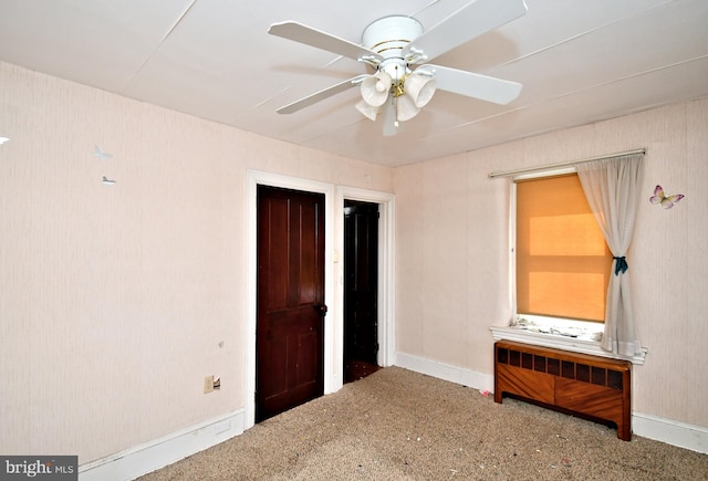 133 Main St, East Greenville, PA 18041 - unfurnished bedroom featuring radiator, baseboards, carpet floors, and a ceiling fan