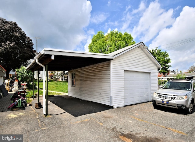 133 Main St, East Greenville, PA 18041 - garage with asphalt driveway and a garage