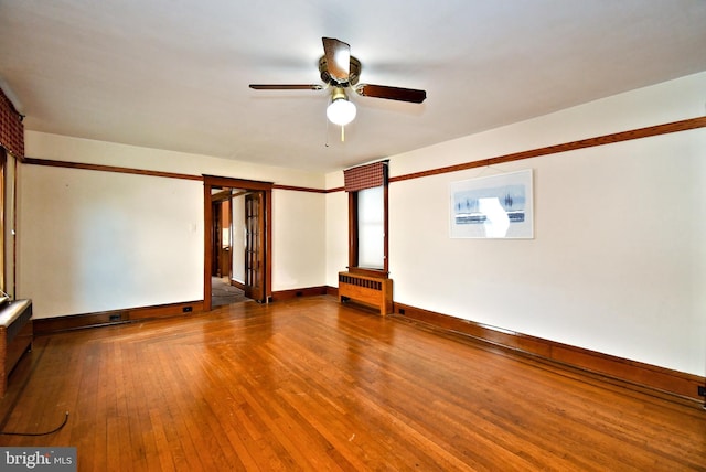 133 Main St, East Greenville, PA 18041 - spare room with radiator heating unit, hardwood / wood-style floors, ceiling fan, and baseboards