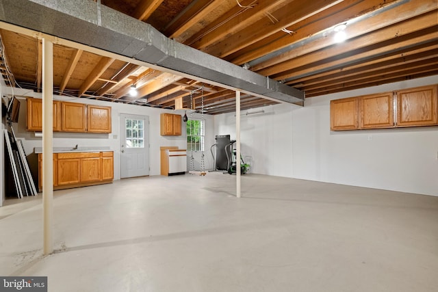 below grade area featuring a sink