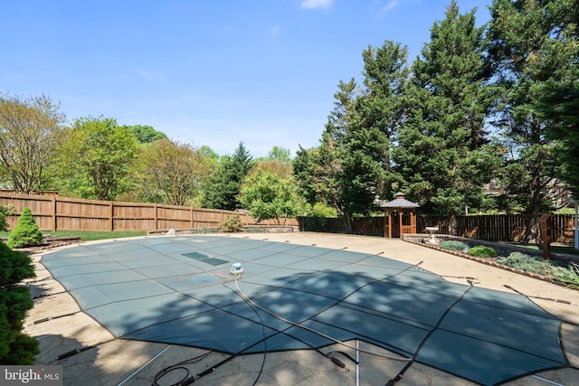 view of pool with a fenced in pool and a fenced backyard